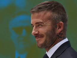 David Beckham with a Mid Taper Fade and textured top